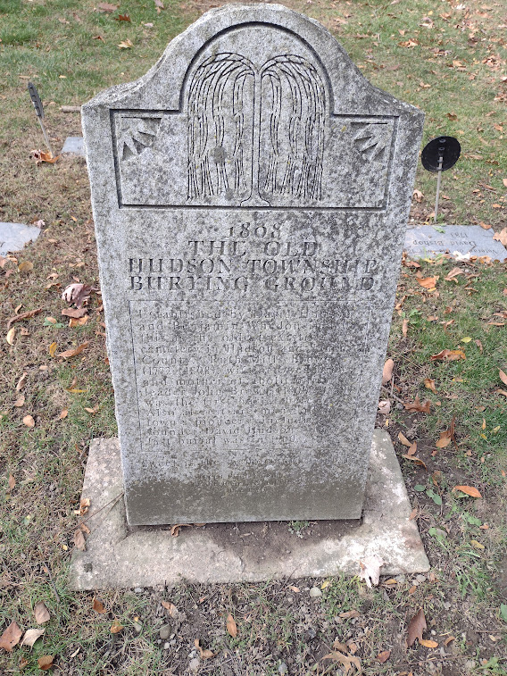 Gravestone with a weeping willow tree depicted on it